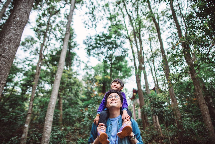 dad hikes with young child