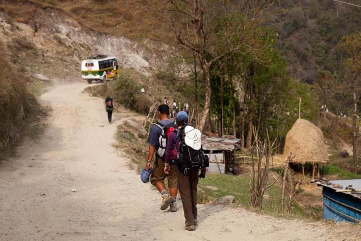 The_trail_from_Besi_Sahar_to_Bhulbule_is_a_road,_with_many,_many_busses_going_by_while_we_walked._(4514774801) Annapurna Circuit Besi Sahar