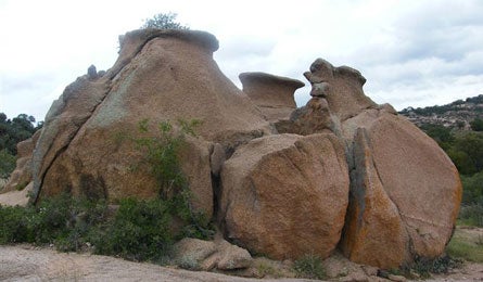 "Van and house-size boulders (a hot spot for local climbers) speckle mile four."