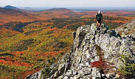 "A hiker climbs Little Knife Edge, Baxter State Park, Maine. (Tim Seaver)"
