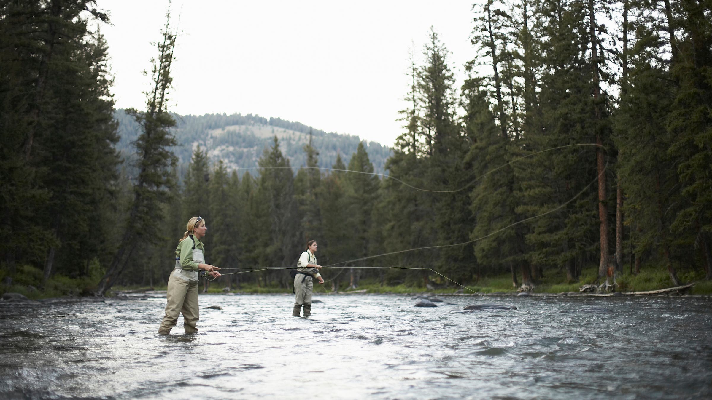 two women fly fishing