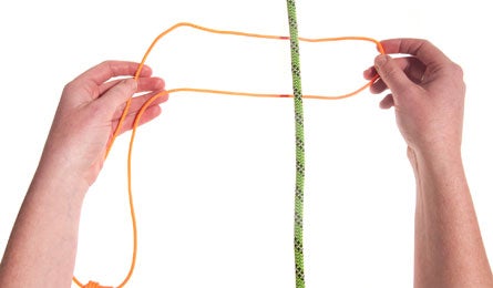 Prusik 2 37001 To start, form a bight in the middle of the paracord and position it perpendicular to the standing line.