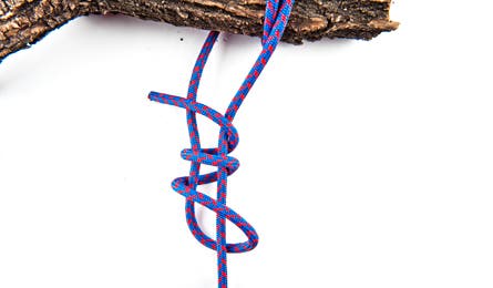Knot-4 445x260 38226 Wrap the working end around the standing end three times.