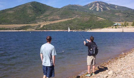 Scott casting in the Redington fly fishing competition