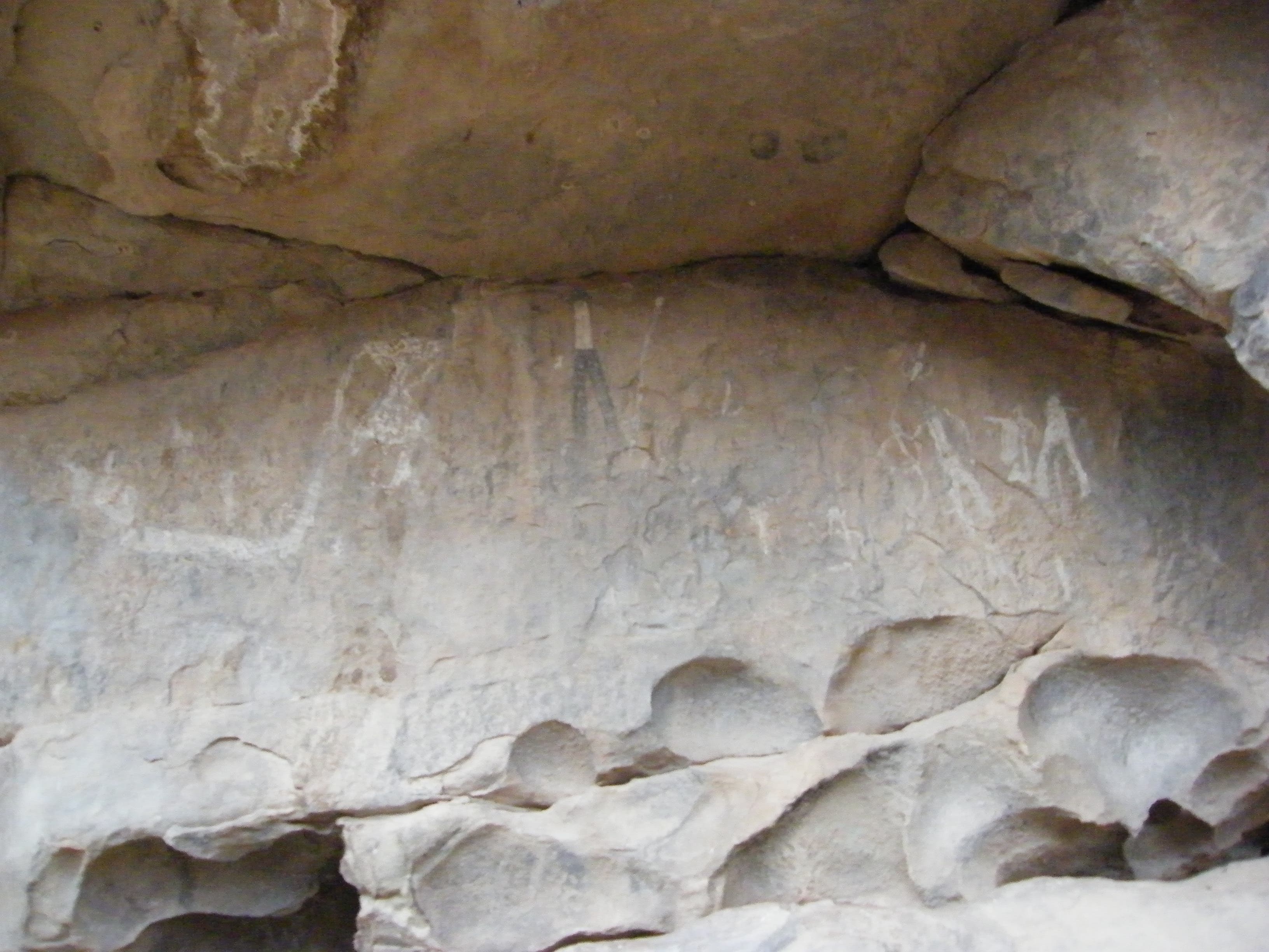 Art under rock overhang. None