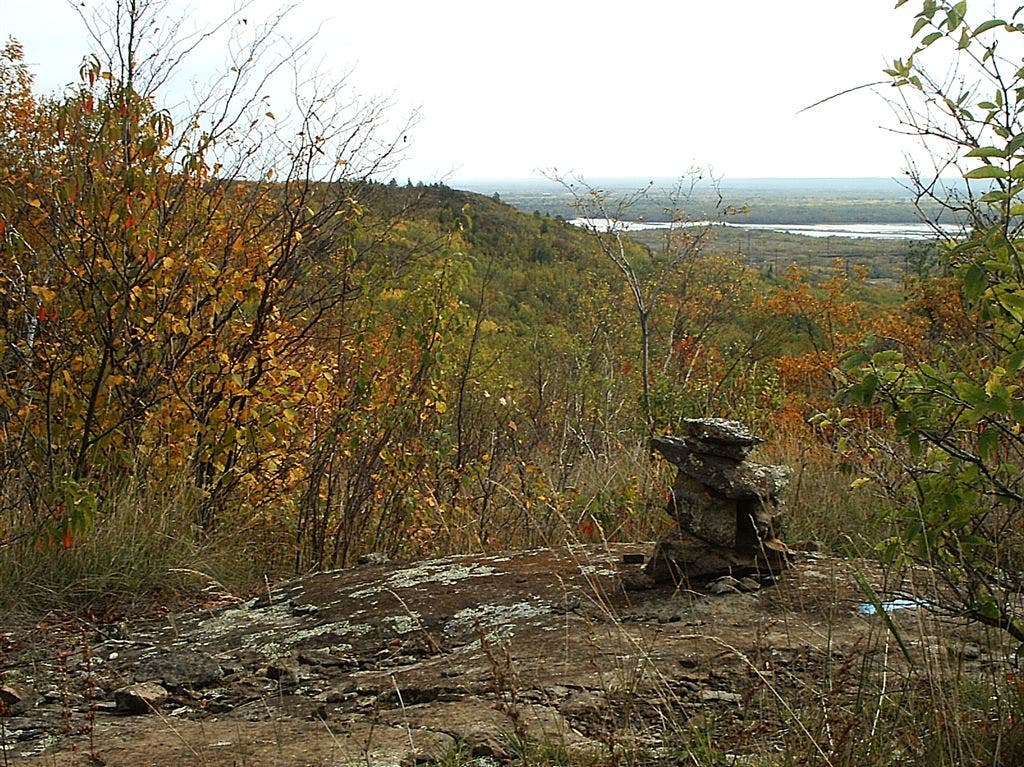 Cairn and view northeast from SHT None
