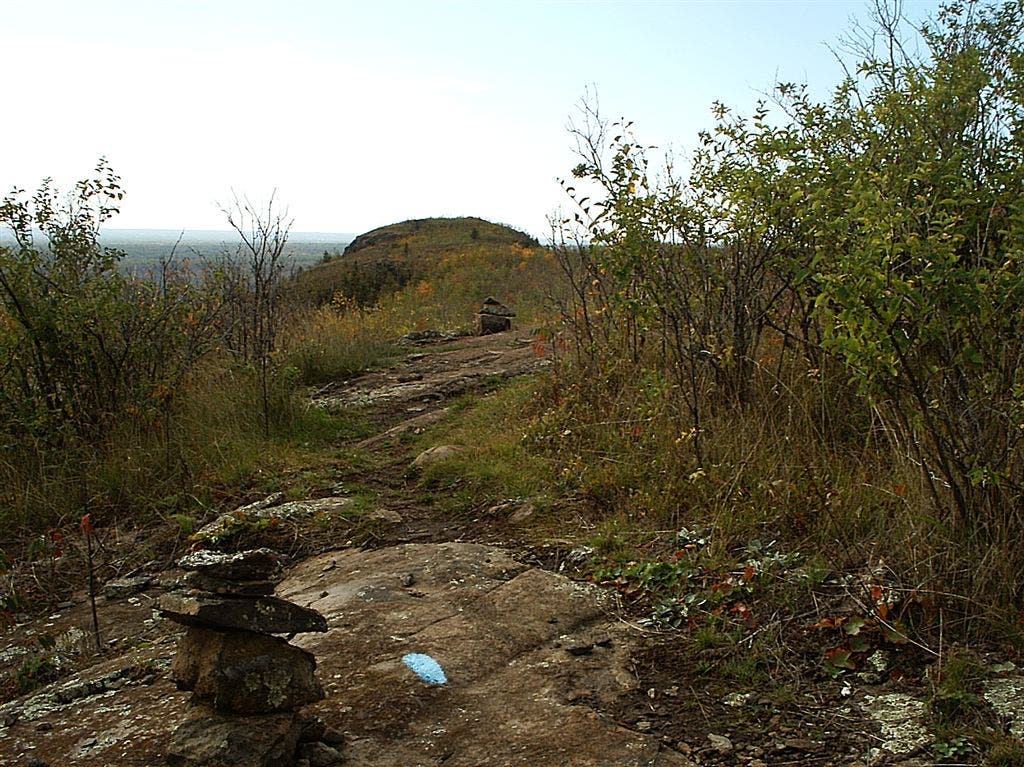 Cairn and view to southwest None