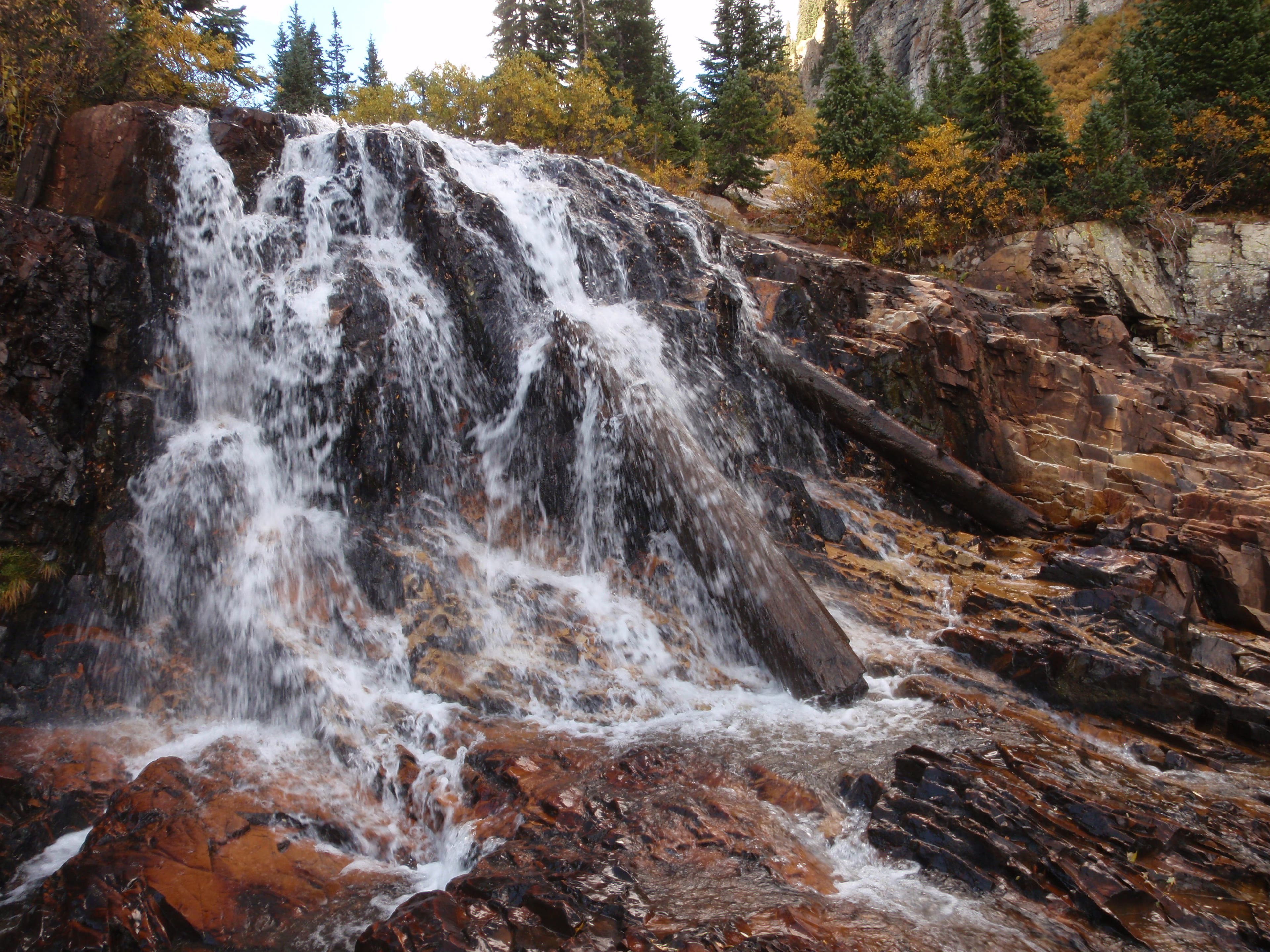 Cascade Creek falls just off the Colorado Trail along the 40 miles between Stony Pass and Celebration Lake. Small waterfall in Cascade Creek located just off the Colorado Trail.