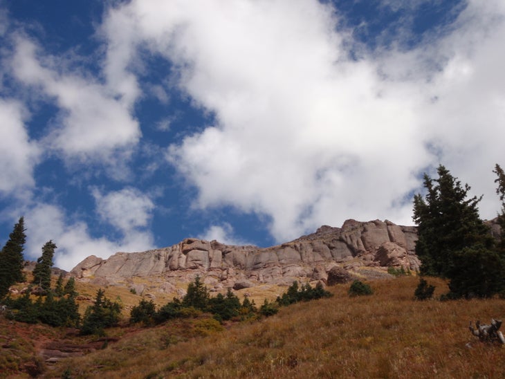 Cliffs line the hill tops None