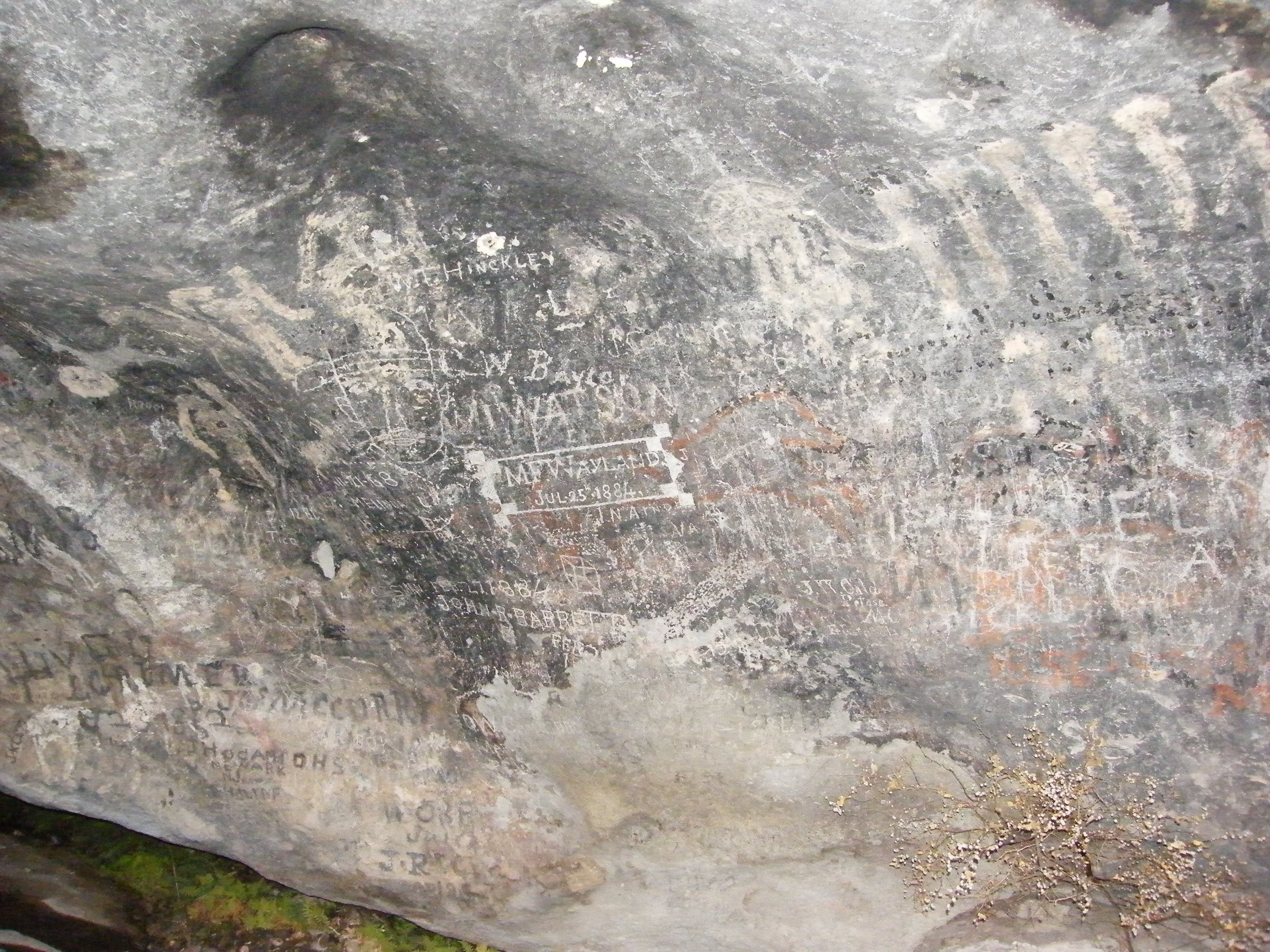 Defaced rock art. None