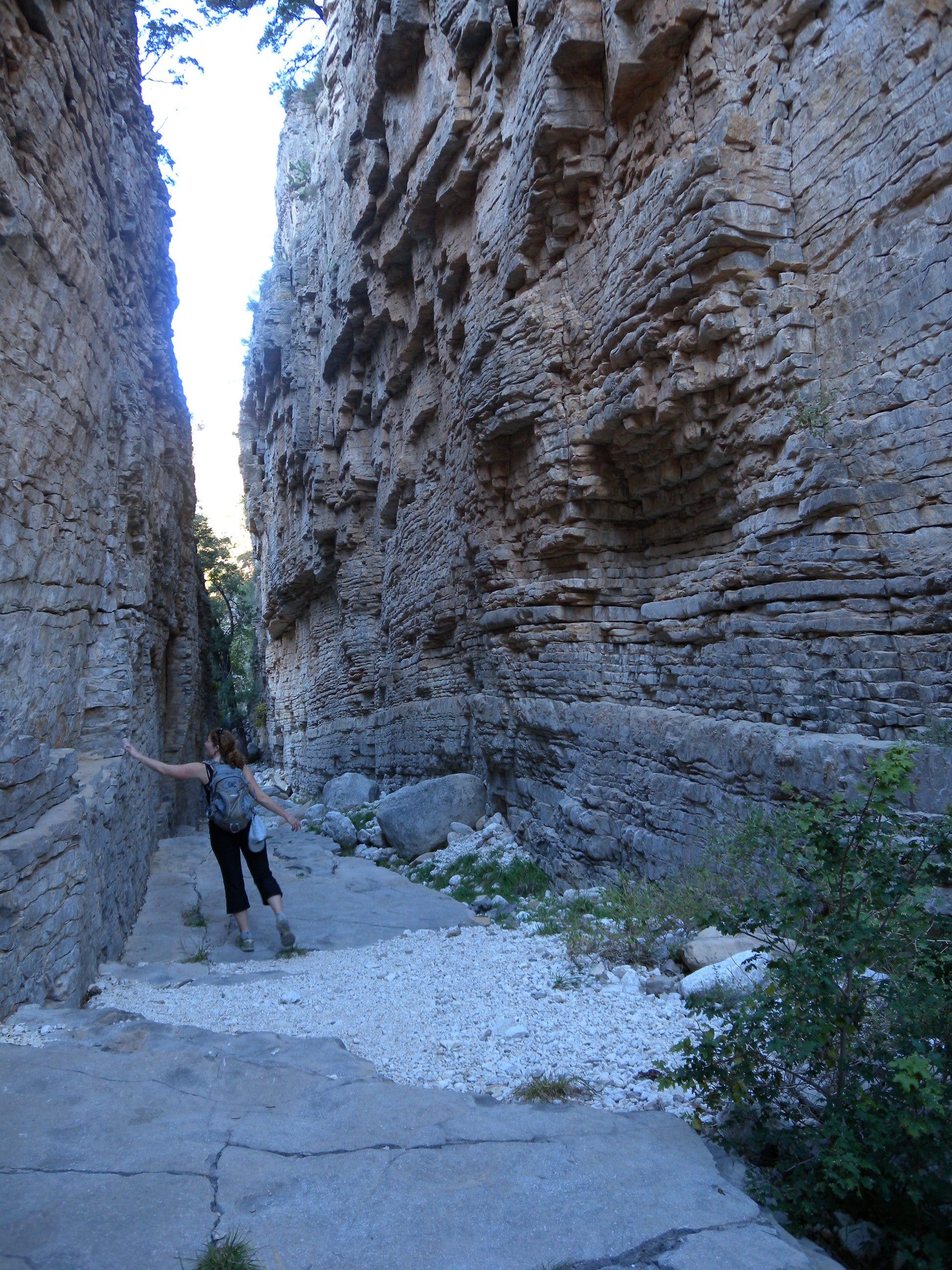 Devil's Hall is the narrow hallway for which this hike is named and is a cool, shaded slot. Devil's Hall is a 15-foot-wide slot flanked on either side by 50-foot cliffs.