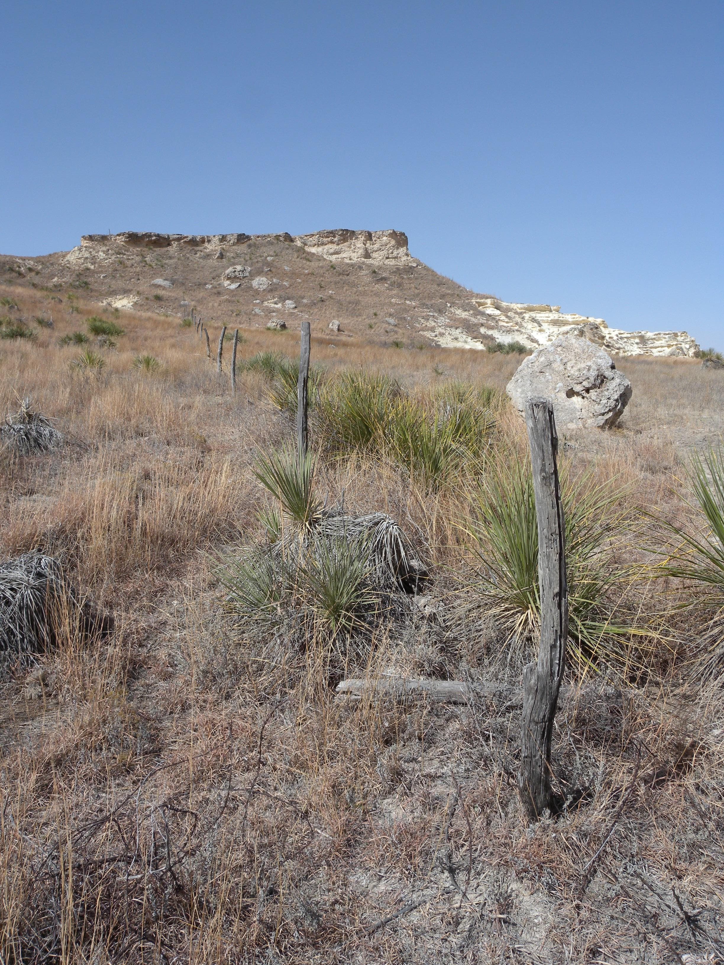 Castle Rock is on private property and old fences crisscross the area. A an old fence crisscrossing the land near Castle Rock.