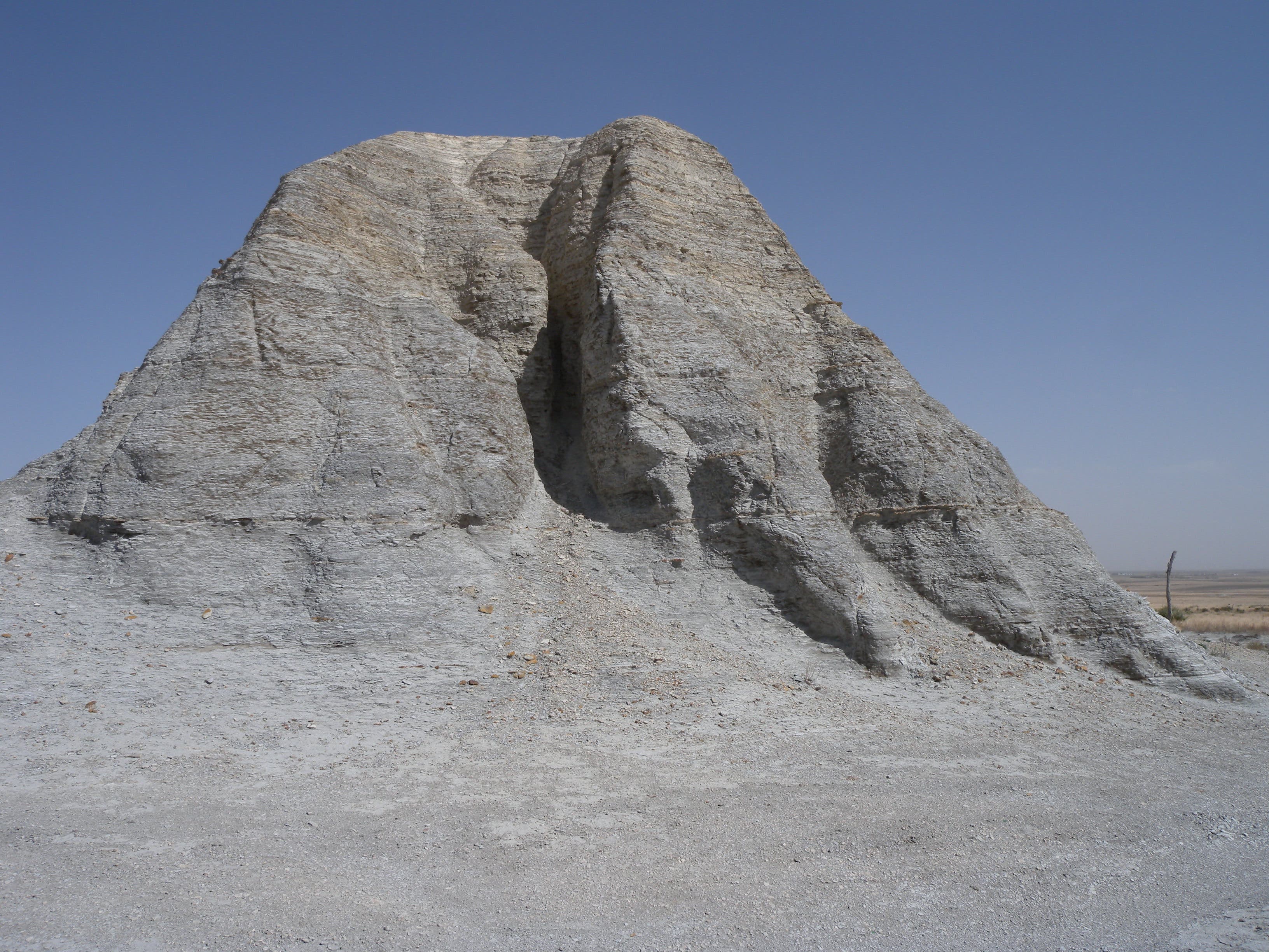 A large grey-colored rock on Castle Rock's north side. 