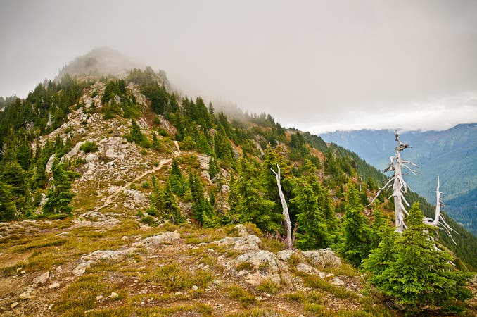 The highest peak along Copper Ridge covered in clouds provides stellar clear-day views on the way to Beaver Trail.