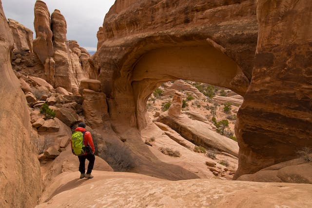 Hiker at Tower Arch None