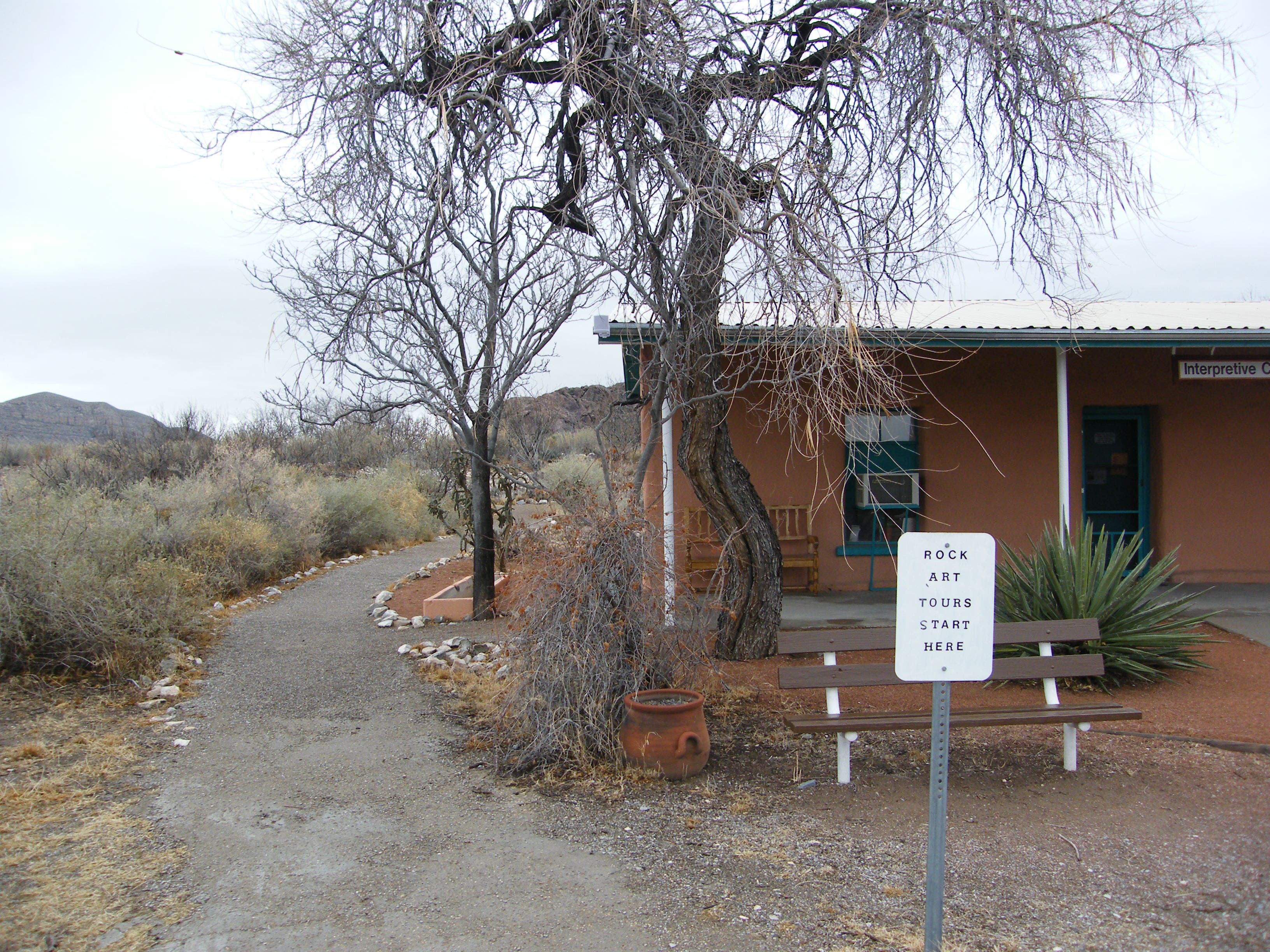Interpretive center at trail head. None