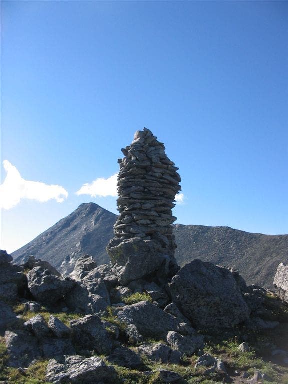 Large cairn and false summit None