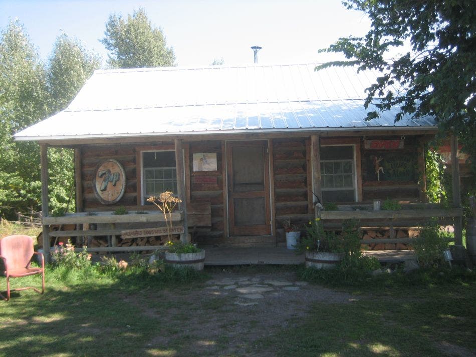 A rustic, small cabin called the Northern Lights Saloon in Polebridge. 