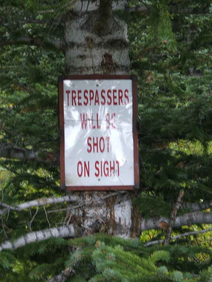Sign in front of miner's cabin None