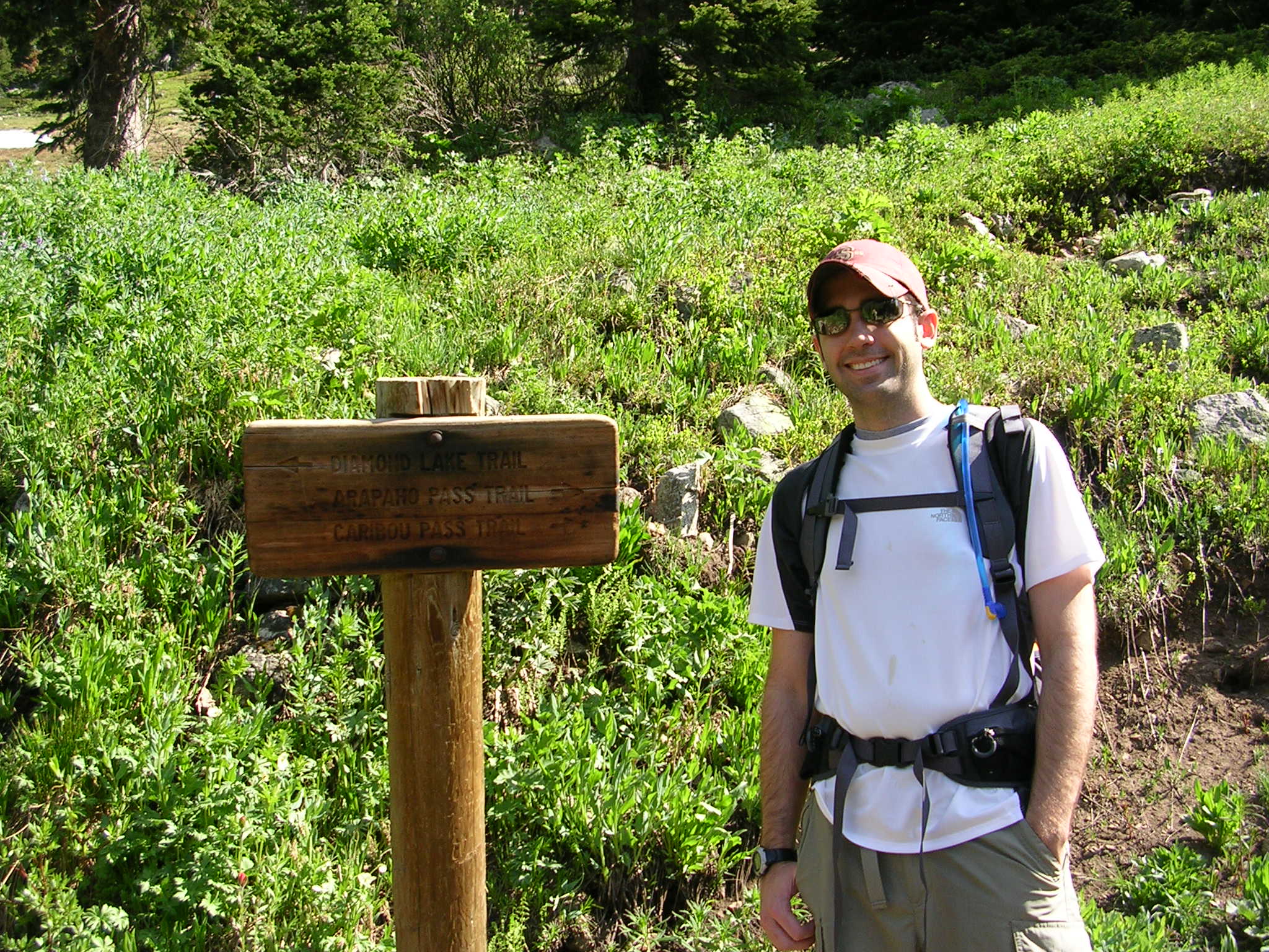 Signs for Arapaho Pass None