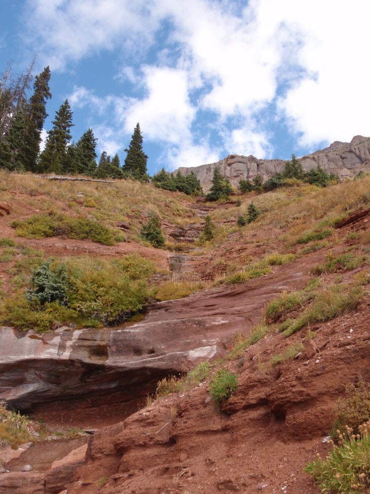 Small stream and rock overhang None