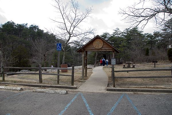 Start of the trail at the Desoto Falls Picnic Area Entry way over a concrete path leading into the Desoto Falls Picnic Area.
