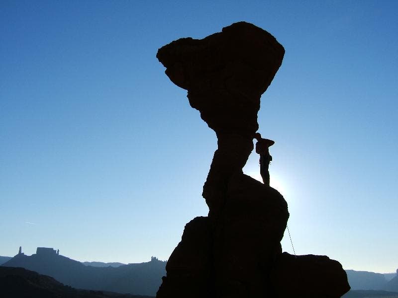 John leading up The Cobra, a climb just feet from where the climberâ€™s path for Ancient Art branches off the main trail through Fisher Towers.