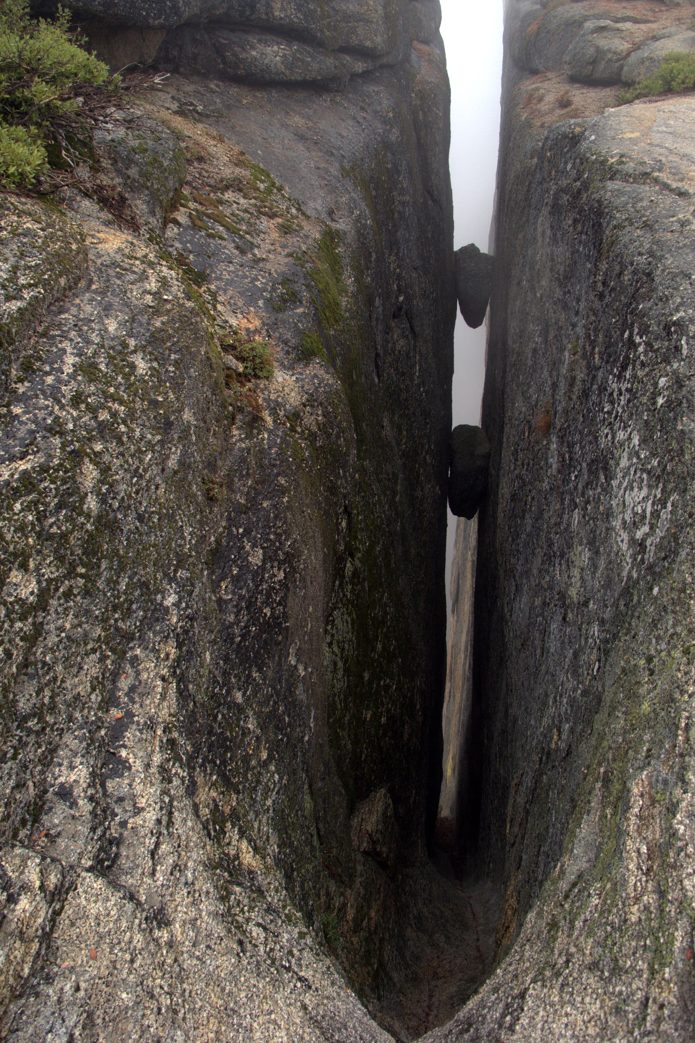 One of many tight vertical slots in the cliff alongside the Pohono Trail called The Fissures. 