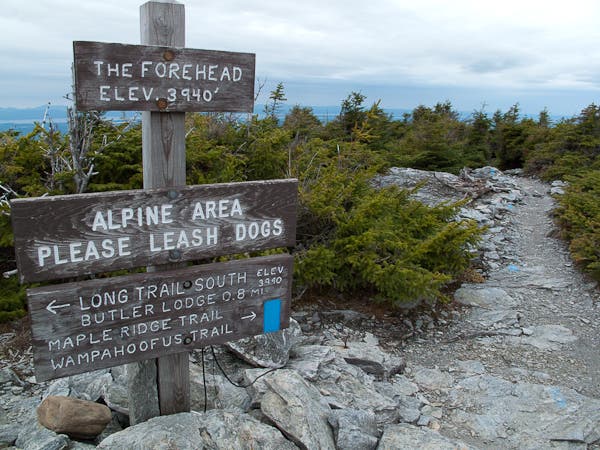 The Forehead, Mansfield's southernmost peak. A trail sign marks the arrival at Mansfield's forehead and the beginning of a 2.3-mile hike to the mountain's true summit.