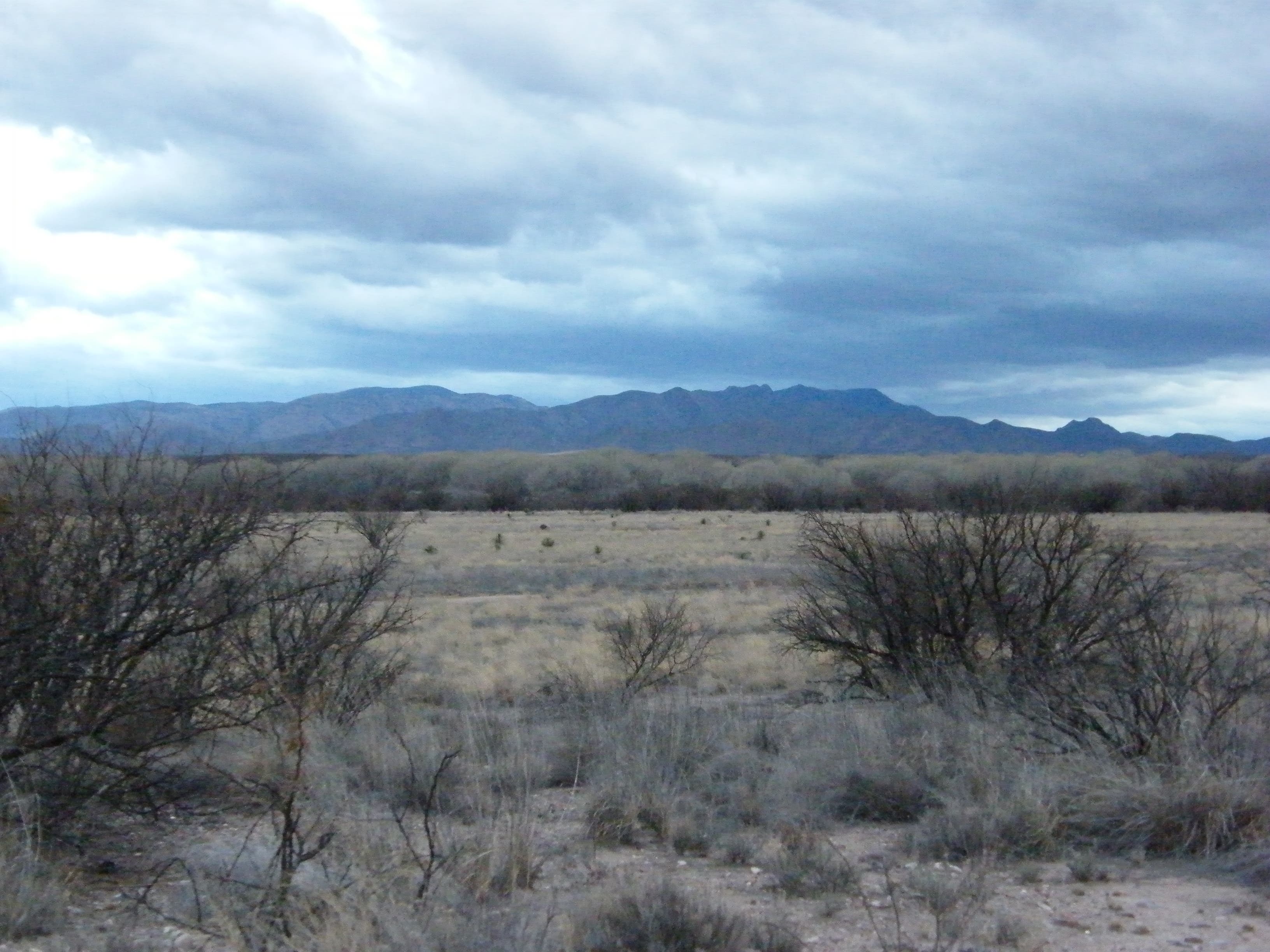 Trail and mountains in the distance None