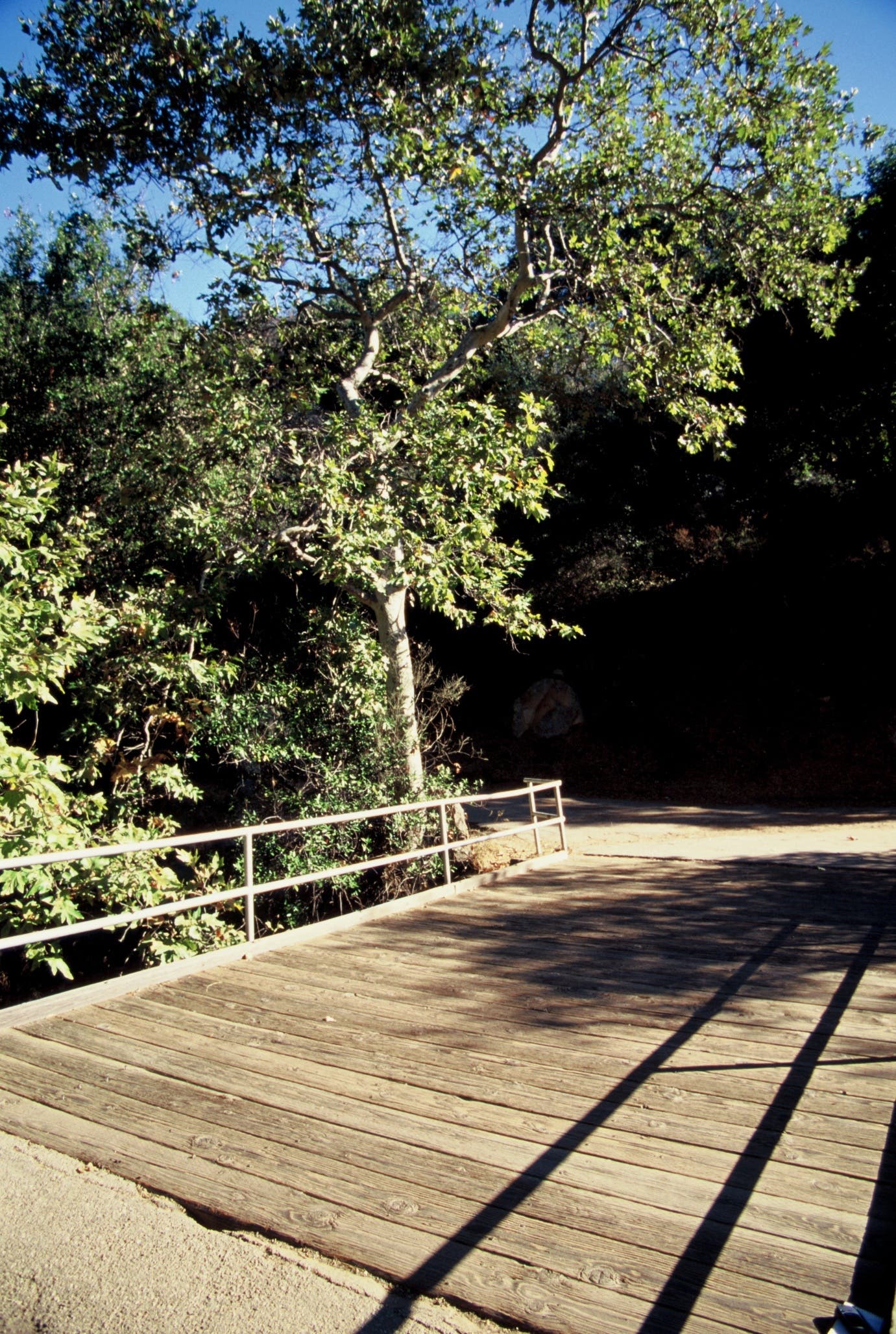 Tunnel Bridge along the hike to Seven Falls. Tunnel Bridge, a wooden bridge across the road that leads to the path up to Santa Barbara's Seven Falls.