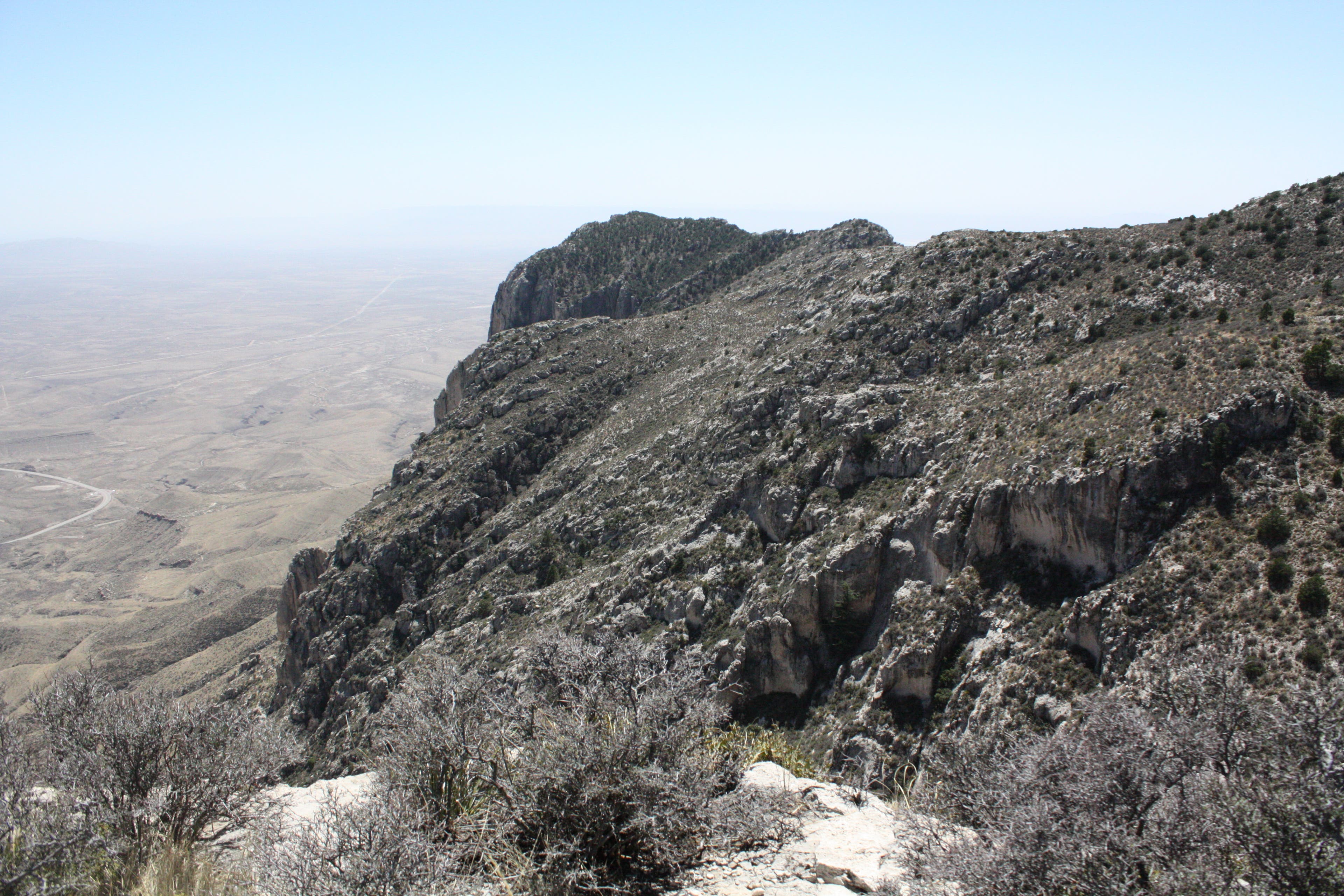 Eastern views of the desert as seen along the hike up Guadalupe Peak. Cliffs and desert views from the Guadalupe Peak Trail.