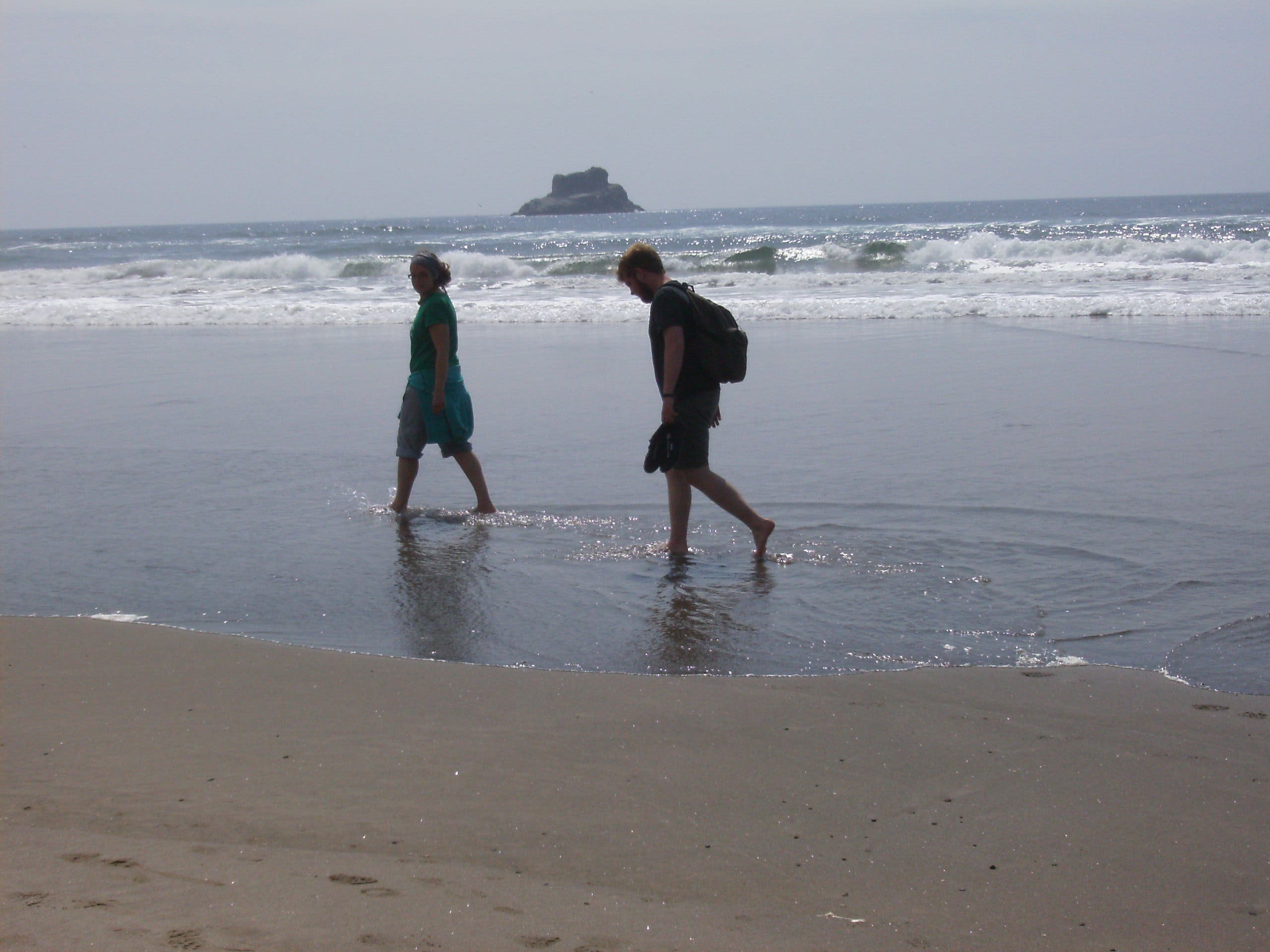 Walking along Arch Cape None