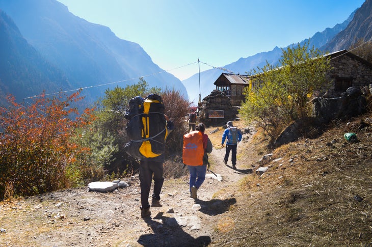 Hikers Head Down Hiking back down the Langtang Valley