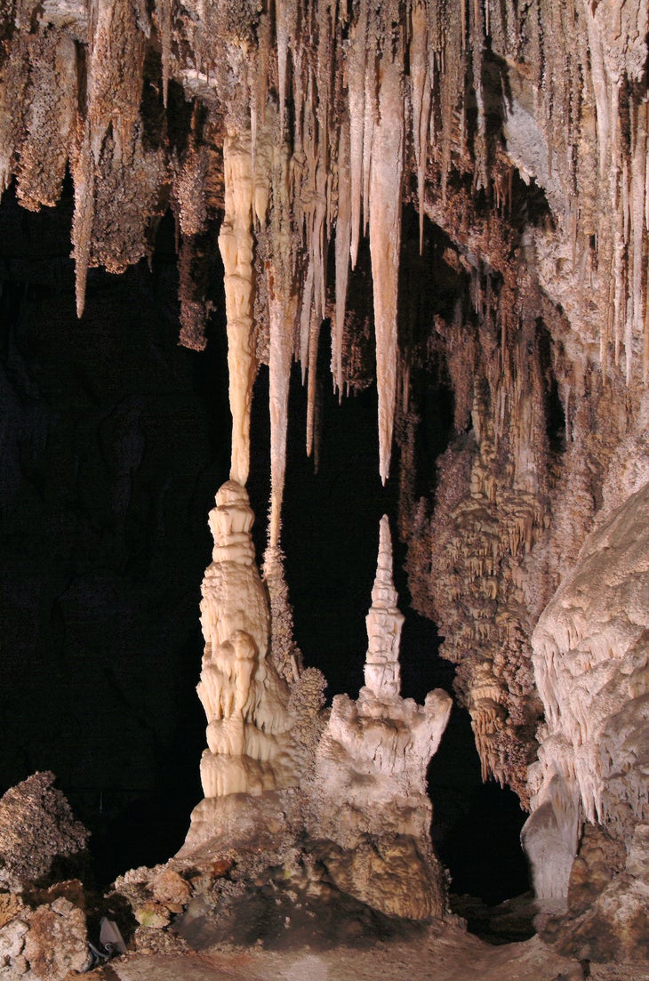 Carlsbad Cavern National Park, Carlsbad, New Mexico Peering into the dark hole that is the entrance to Carlsbad Caverns is a little unsettling, but the self-guided tour will make you forget all that’s…