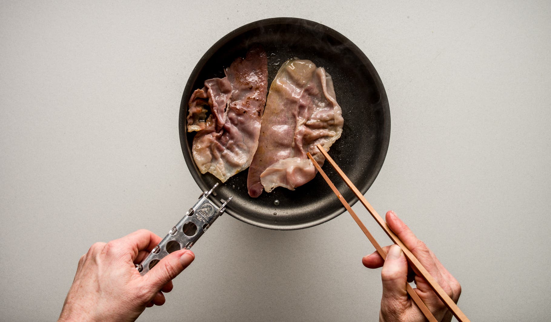 Eggs Benedict: Step 2 Lightly oil a small pot and add the salami or prosciutto (you can skip the oil if your pot is non-stick). Heat the pan over medium-high heat, leaving…