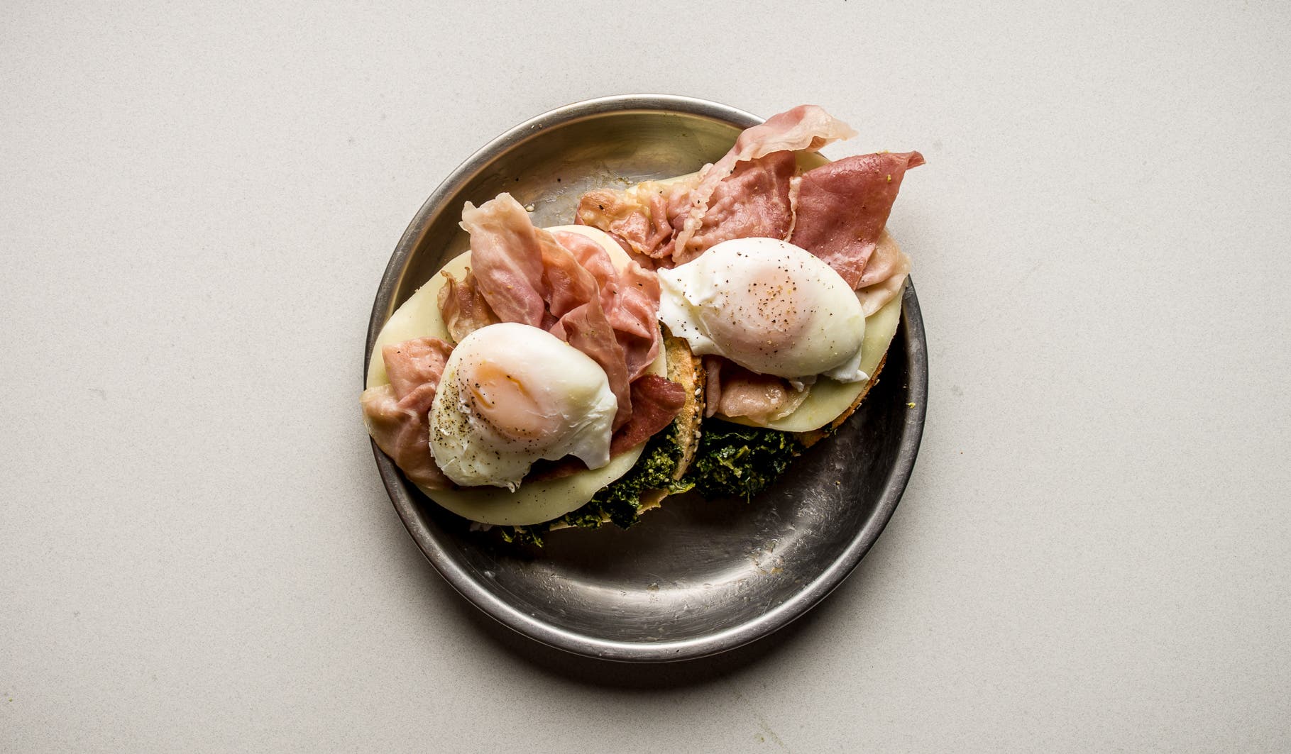 Voila! A beautiful meal fit for royalty. Eat it while it’s hot! You can use different varieties of cheese, bagel, meat, and kale chips for endless…