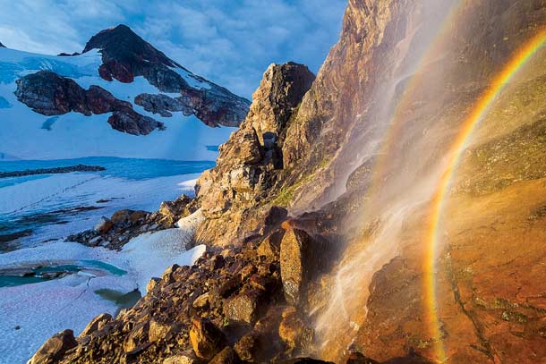 North Cascades National Park - Colonial Creek Falls Welty knew 2,854-foot Colonial Falls was a stunner, but he didn't expect to see a tiny rainbow on it at 6:30 a.m. in Colonial Basin, 3.8 miles up the…