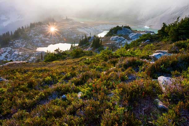 Tapto Lakes The sun is reflected by the glassy surface of a tiny tarn at Tapto Lakes in North Cascades National Park. Pro tip: This basin makes an excellent…