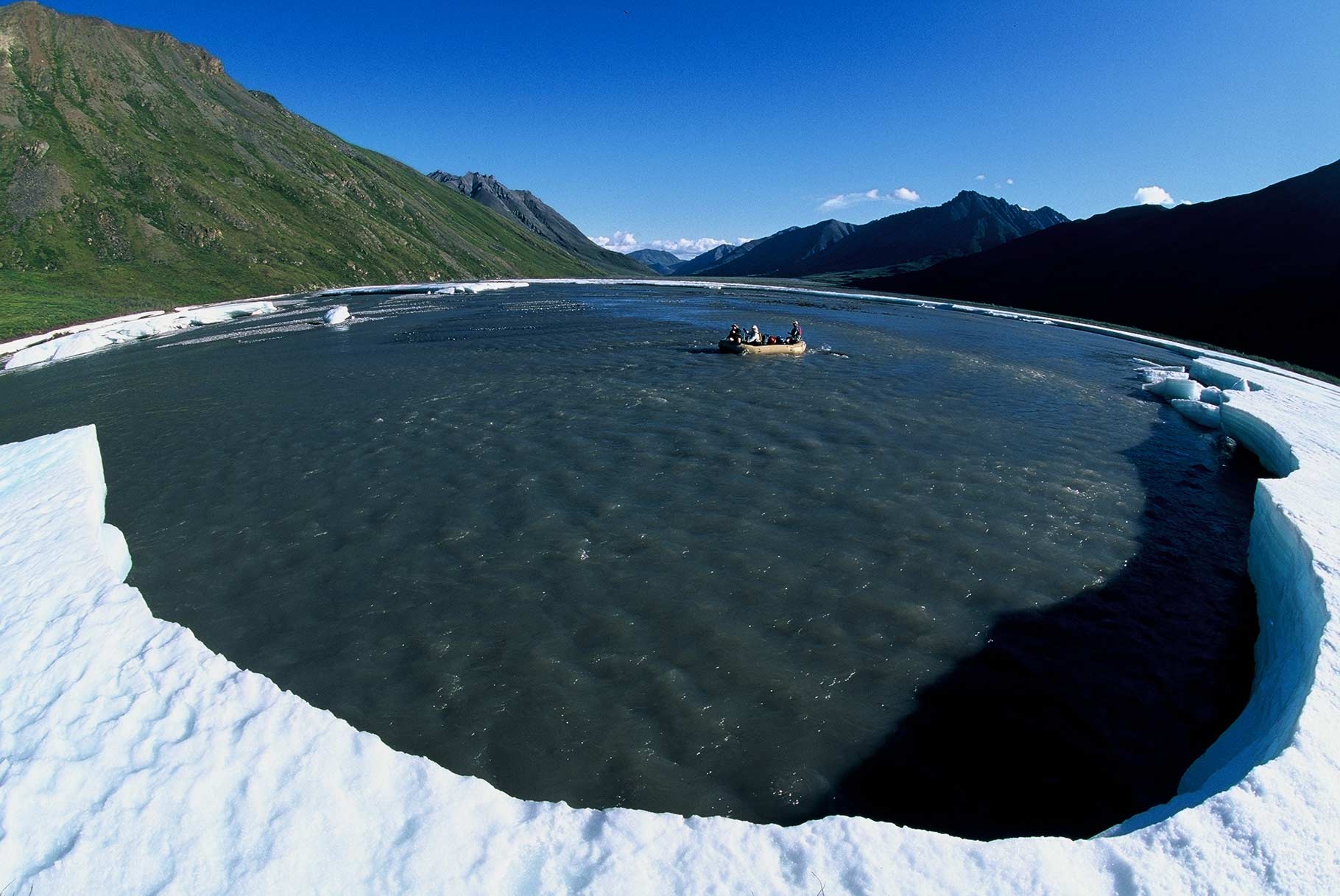 After getting dropped by a bush pilot on the North Slope of the Brooks Range next to the Upper Marsh Fork River, Graham and his team had to avoid…