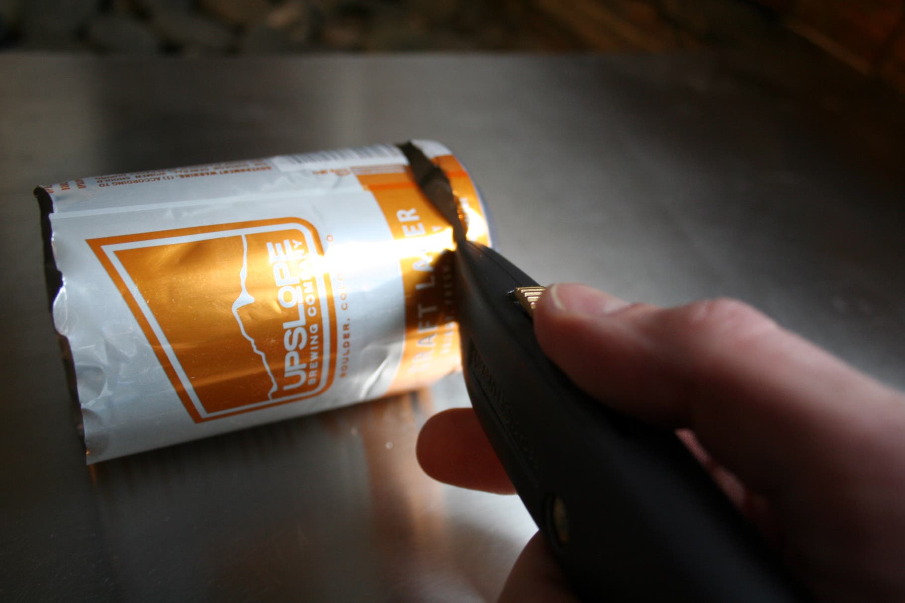 Beer Can Visor: Step 3 Now, take the scissors and cut the cylinder vertically. Keep in mind what is in the center of the resulting rectangle will be the center of your…