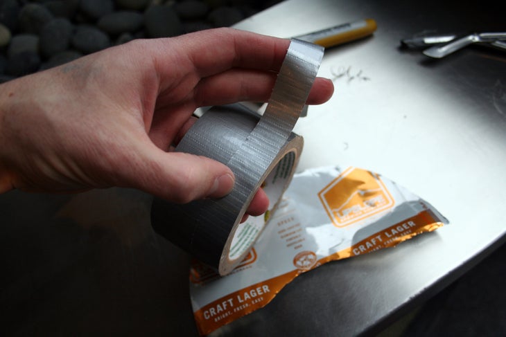 Beer Can Visor: Step 6 Use thin strips of duct tape to line the sharp edges.