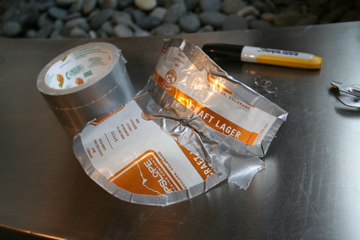 Beer Can Visor: Step 8 Ask for help sizing, then finish the job by covering up any seams with more tape.