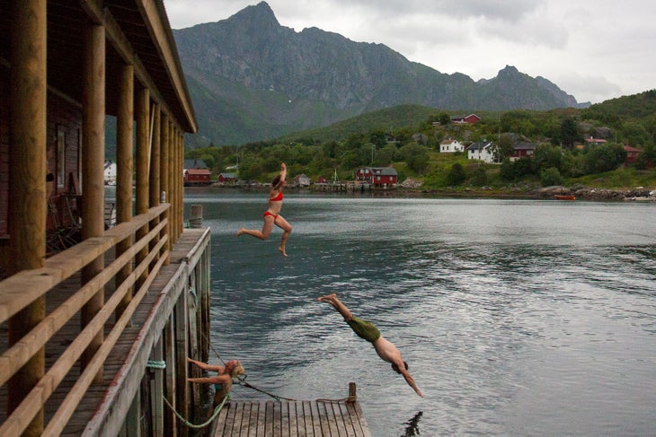 Norway: Into the Sea Majka Burhardt and Peter Doucette, celebrating day five of being married by jumping into the Norwegian sea.