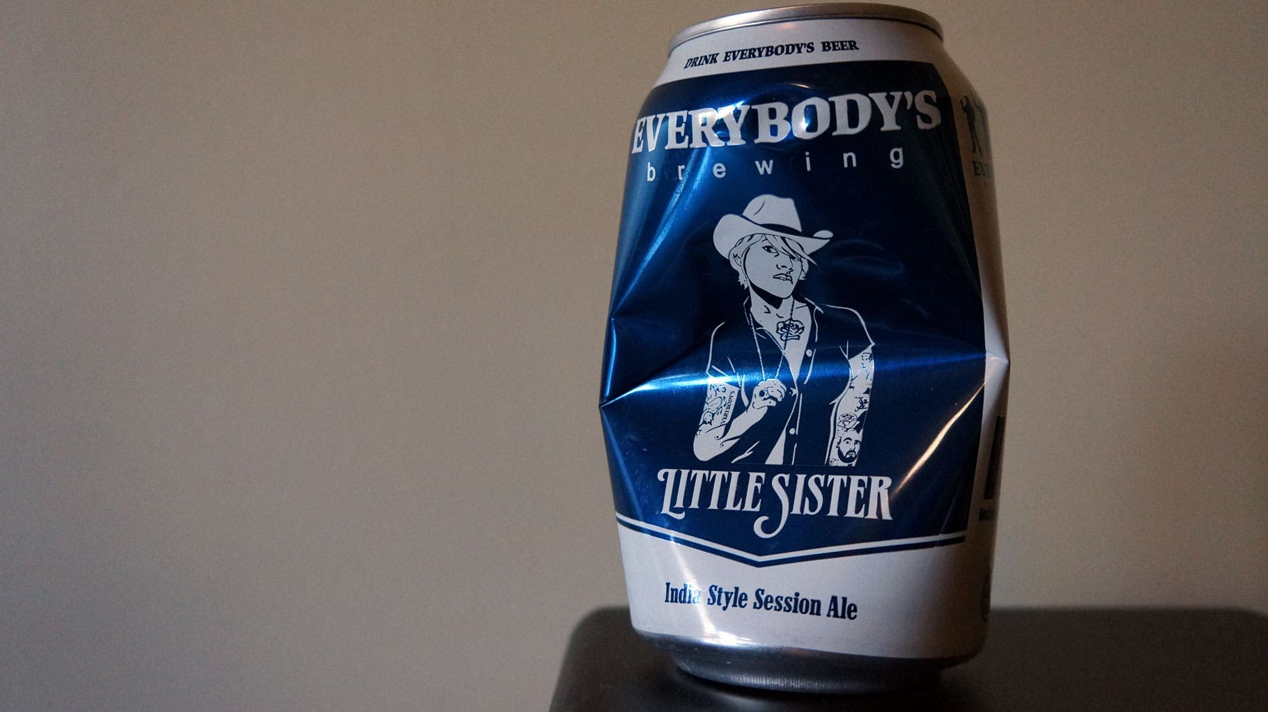 Soda Can Survival: Step 2 Squeeze your can in the middle gently, making it ever so slightly into an hourglass shape. Break off the tab and save it.