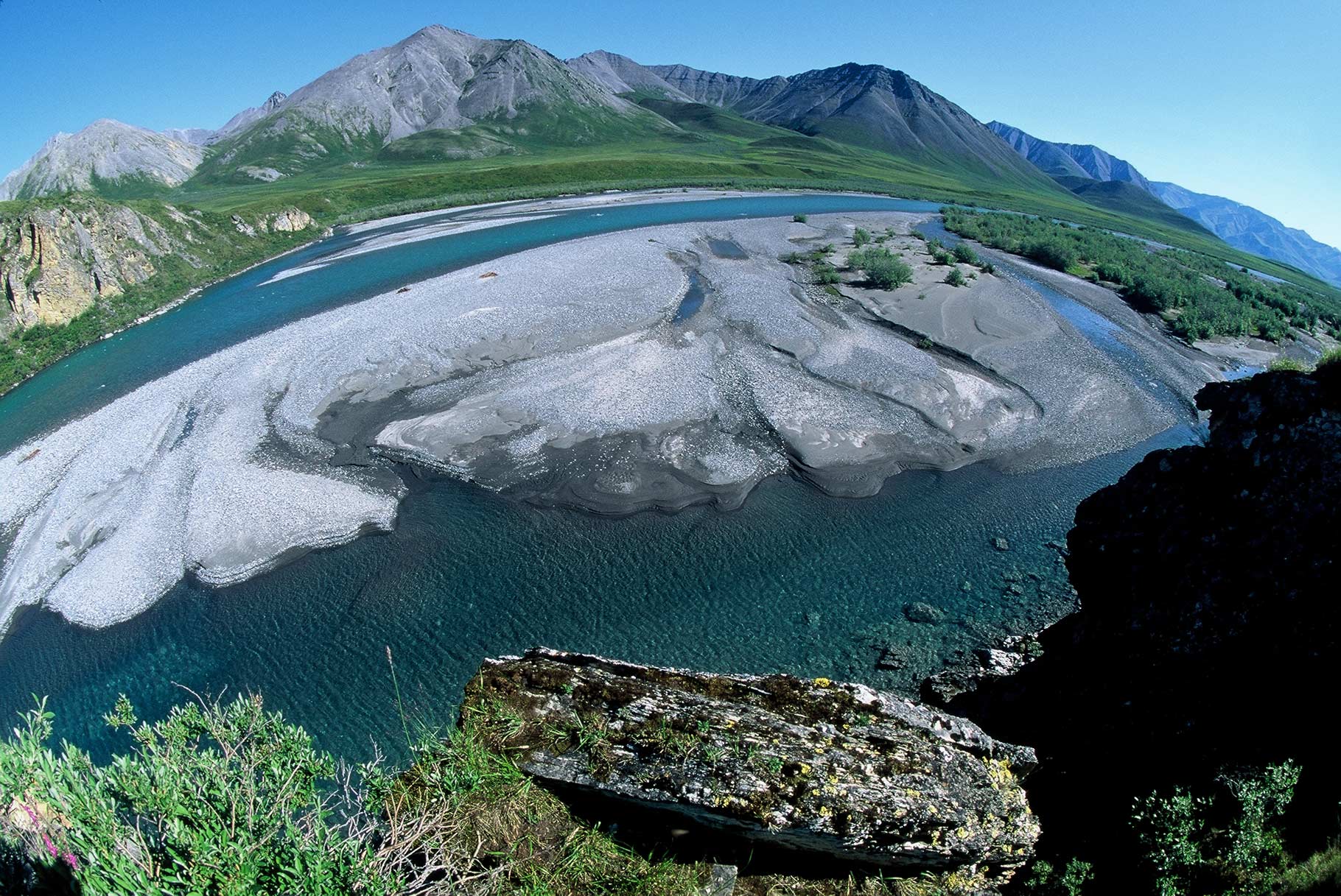 The Canning River After leaving the Upper Marsh Fork, the group connected with the Canning River. I took this image high on a cliff overlooking this huge gravel bar. …