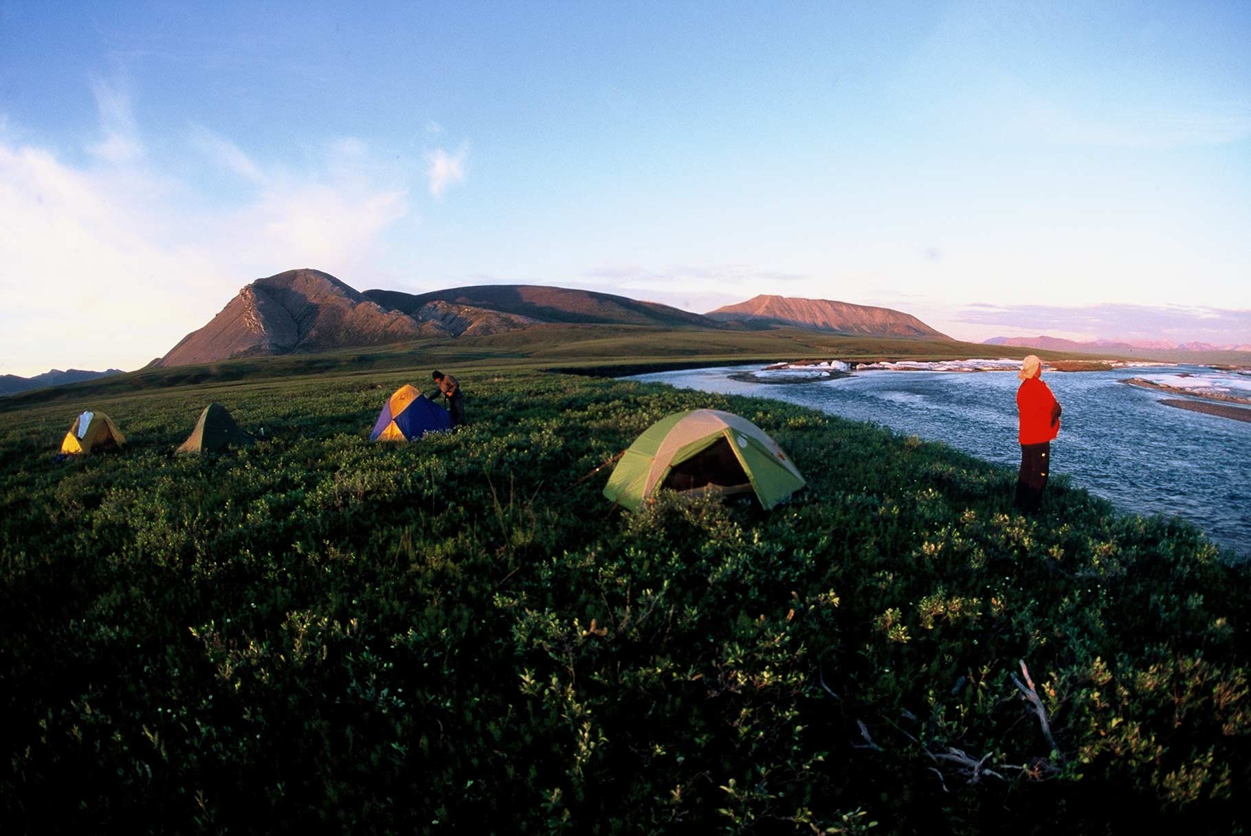 “We usually paddled until midnight because it never gets dark, so we usually pitched our tents late in the night,” says Graham. This campsite is…