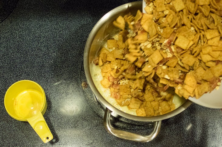 Bacon Krispy Bars: Step 4 Add cereal and bacon mixture. Stir well, using a rubber scraper, until well incorporated.