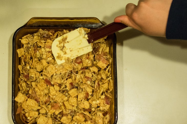 Bacon Krispy Bars: Step 5 Transfer mixture to baking pan, pressing with the flat side of the rubber scraper until the top is relatively level, without smashing cereal pieces.…