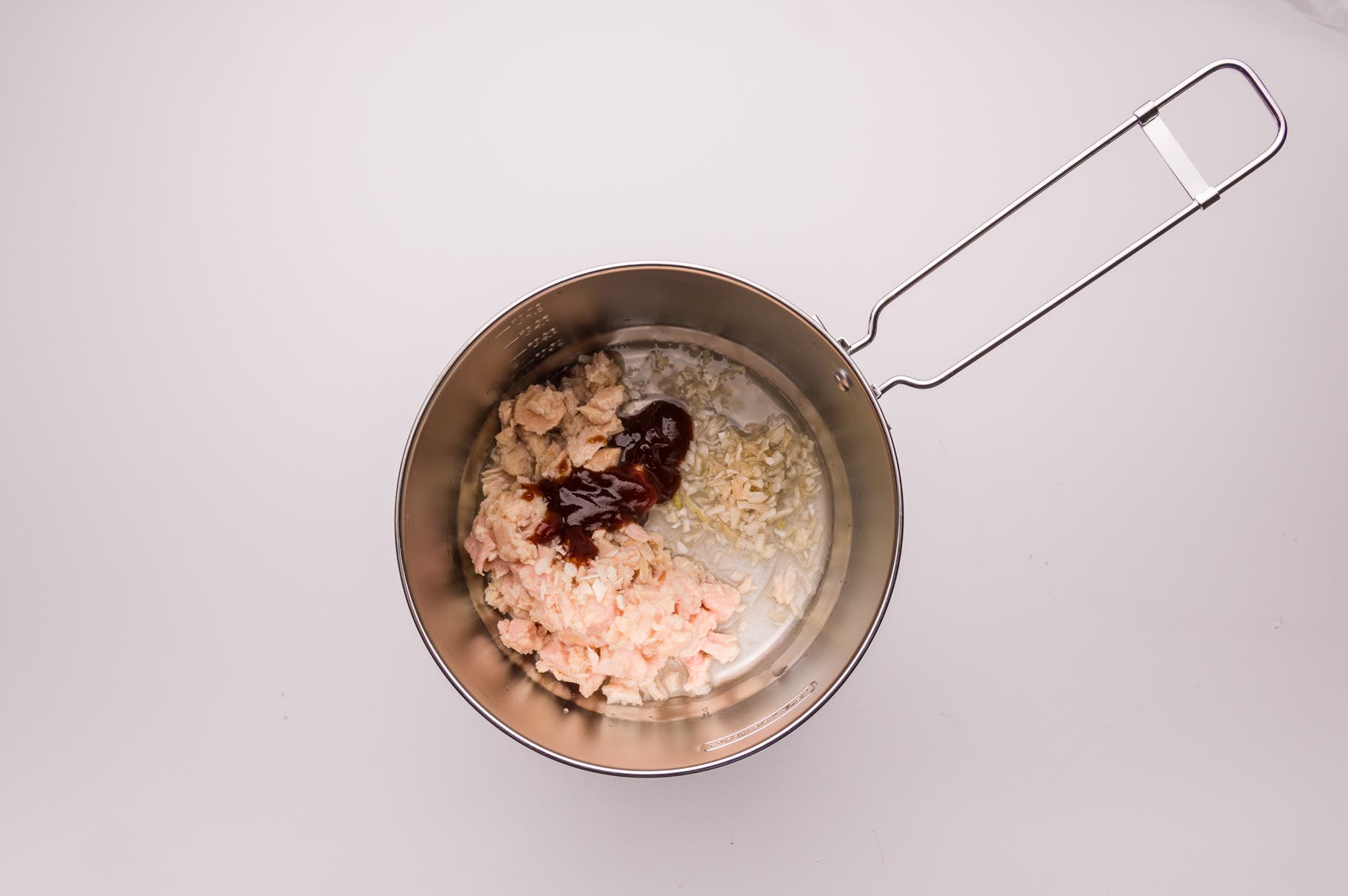 Barbecue Chicken Sliders: Step 3 In camp (If using freeze-dried chicken, rehydrate according to package directions.) Add enough water to your pan to just cover the bottom (about 2…